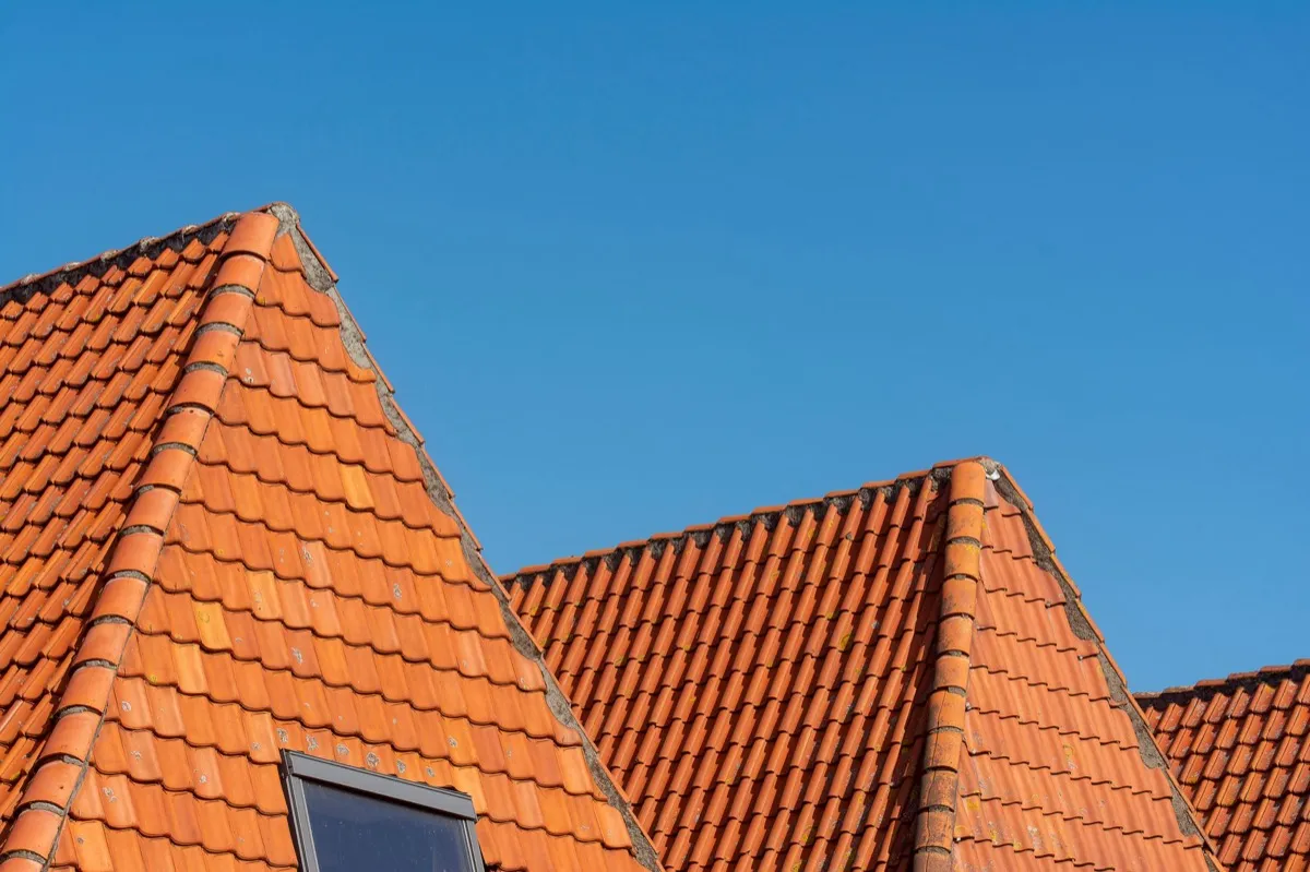 Clay barrel tile rooflines on homes in Owensboro, KY